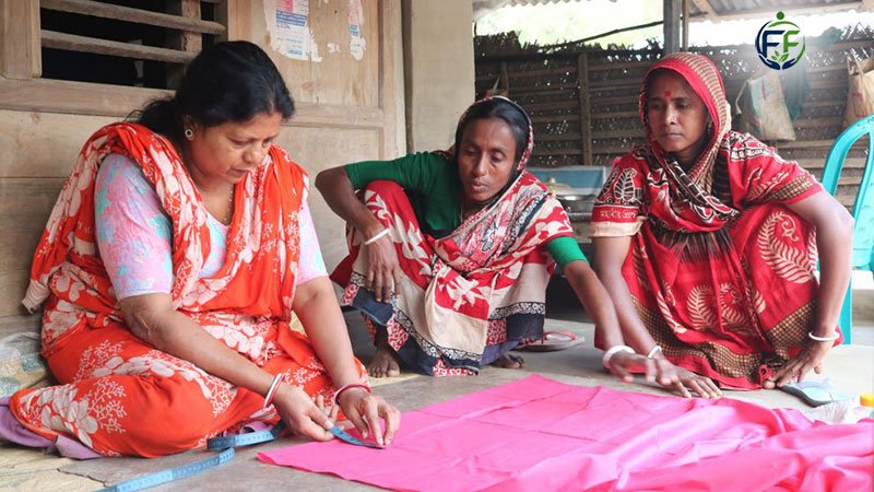 Bangladeshi woman entrepreneur managing a small retail or home-based business
