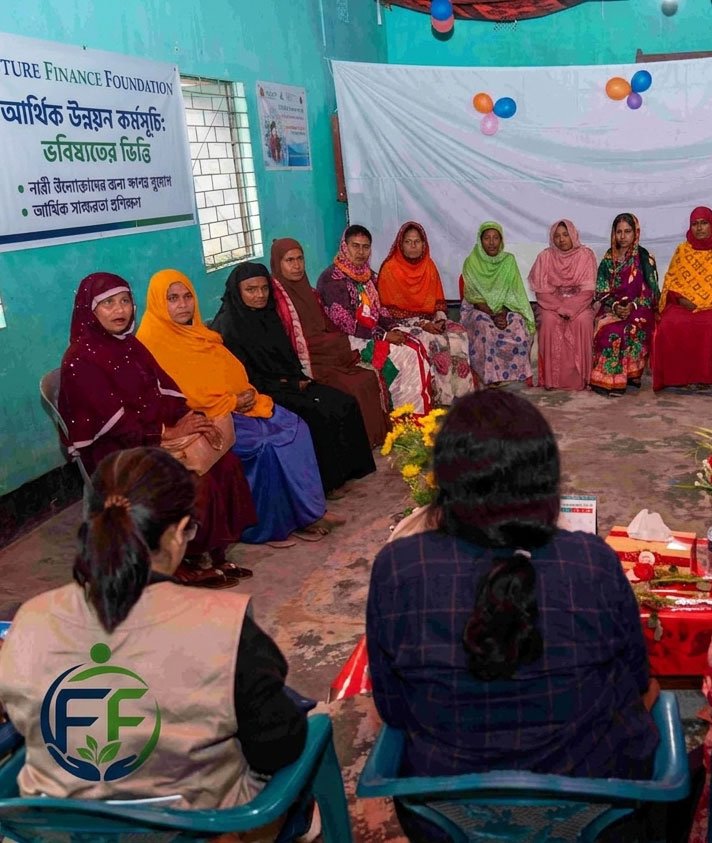 Future Finance Foundation field staff speaking with local community members in a Bangladesh village